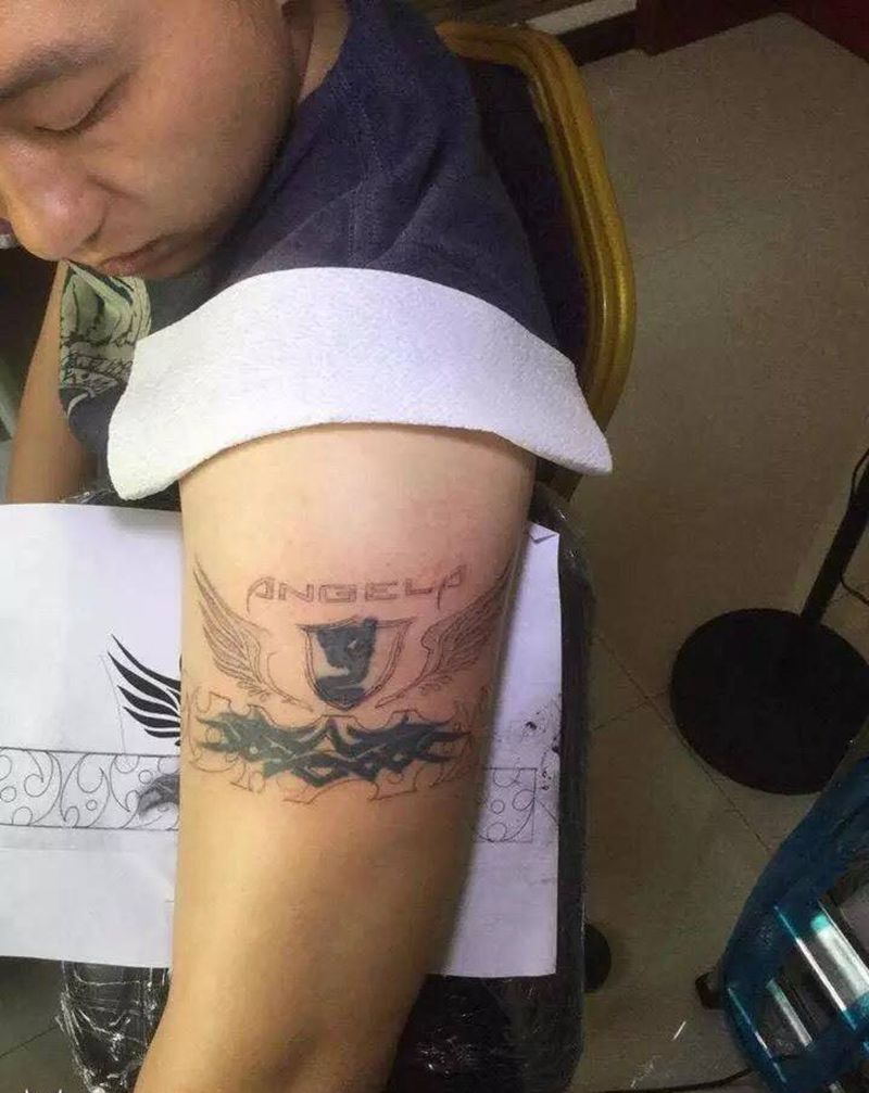 大臂图腾遮盖纹身图片_成品手臂传统图腾原创纹身图案