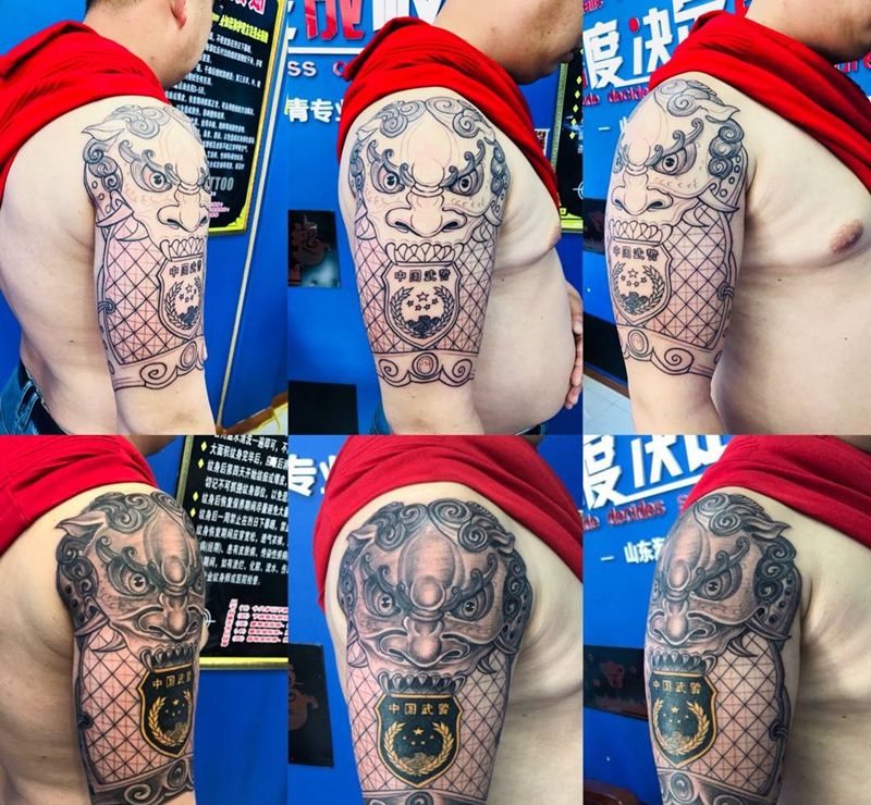 大臂铠甲纹身图片