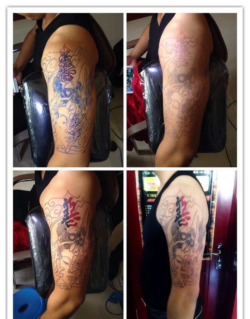 大臂善恶一瞬间纹身图片_手臂肖像传统人物纹身图案