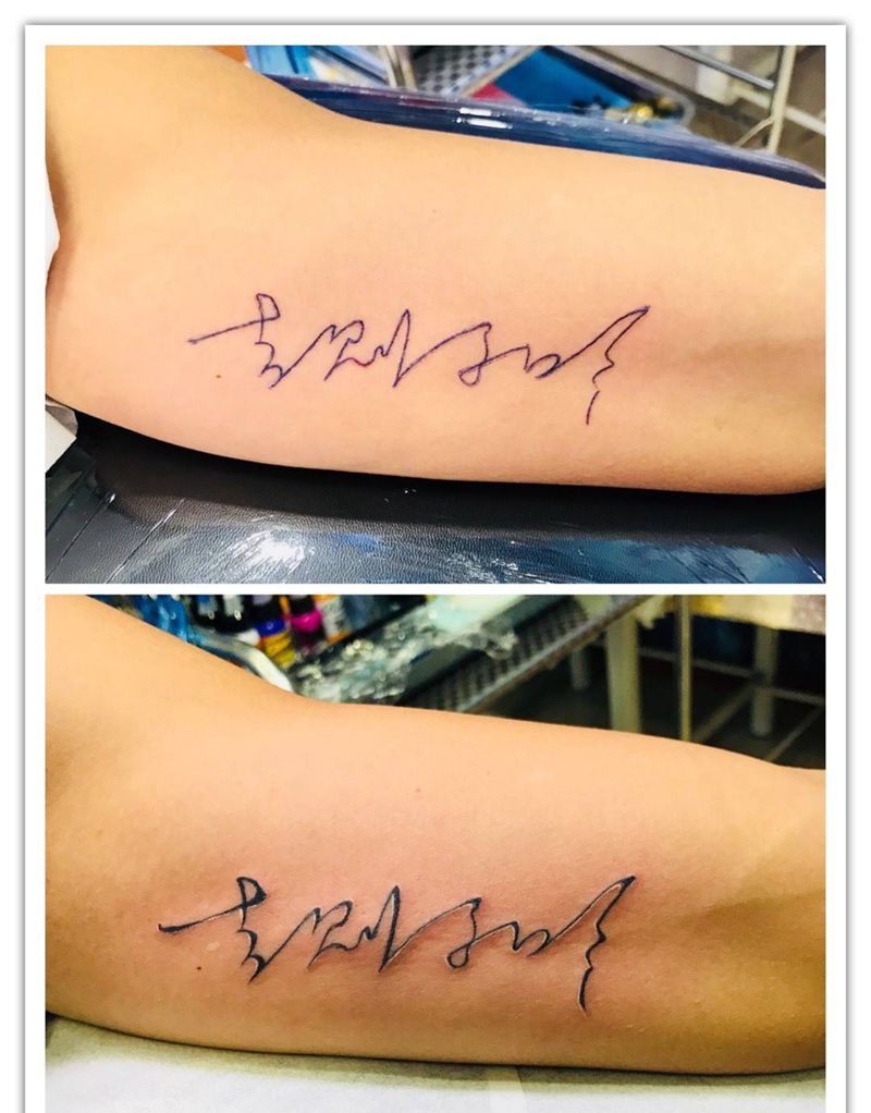 大臂内侧名字纹身图片