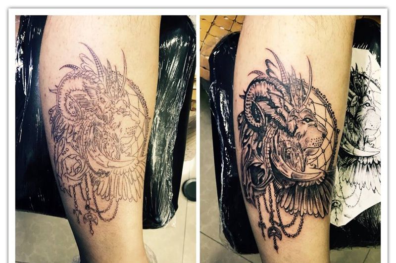 小腿外侧百兽图纹身图片