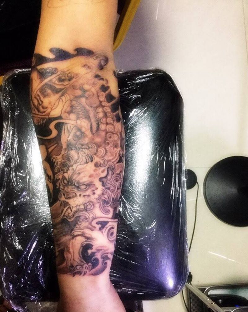 包小臂招财麒麟纹身图片_成品手臂传统动物纹身图案