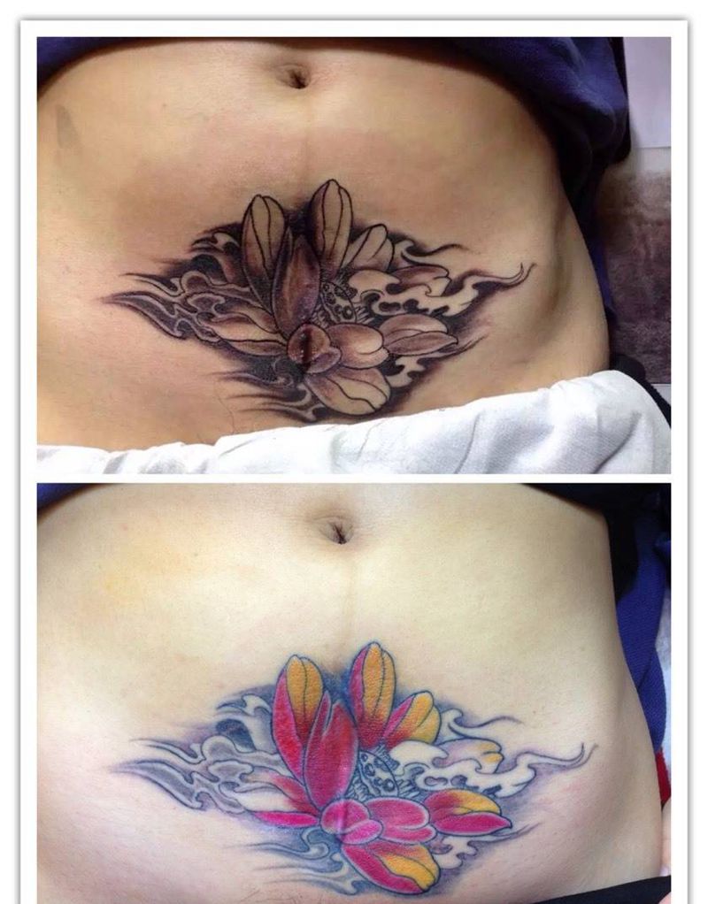 疤痕遮盖纹身图片_腹部传统植物纹身图案
