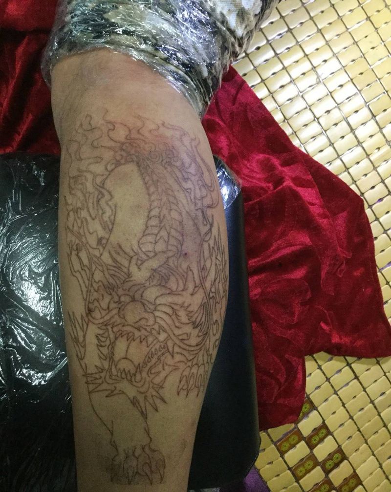 小腿貔貅纹身图片_成品腿部动物纹身图案