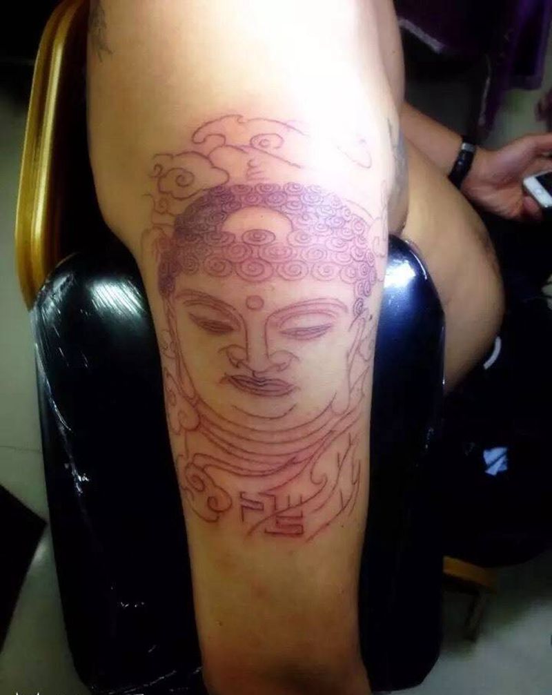 大臂佛头纹身图片_成品手臂写实人物宗教纹身图案