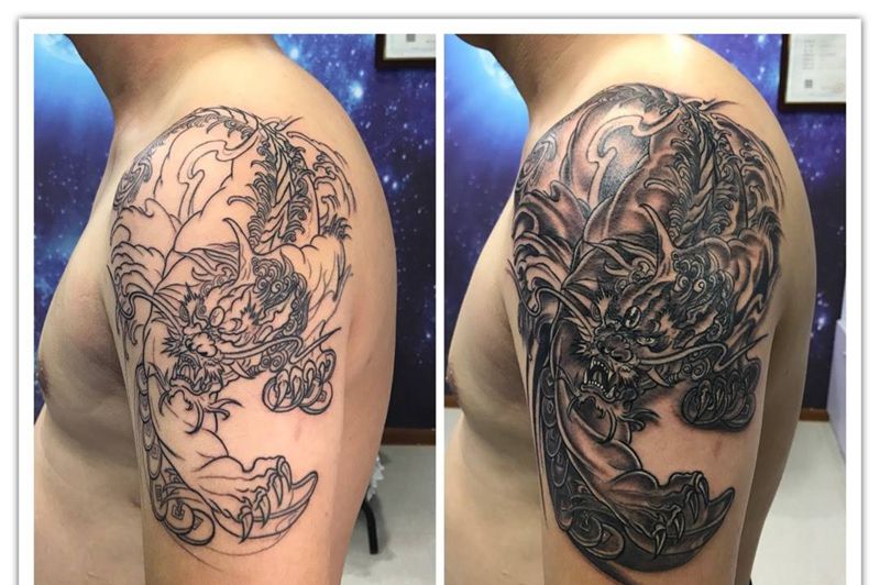 大臂貔貅纹身图片