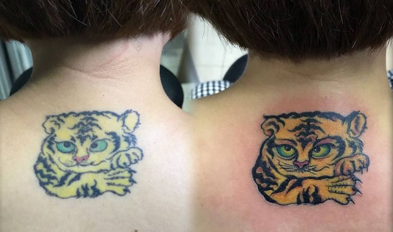 后颈萌虎修改纹身图片