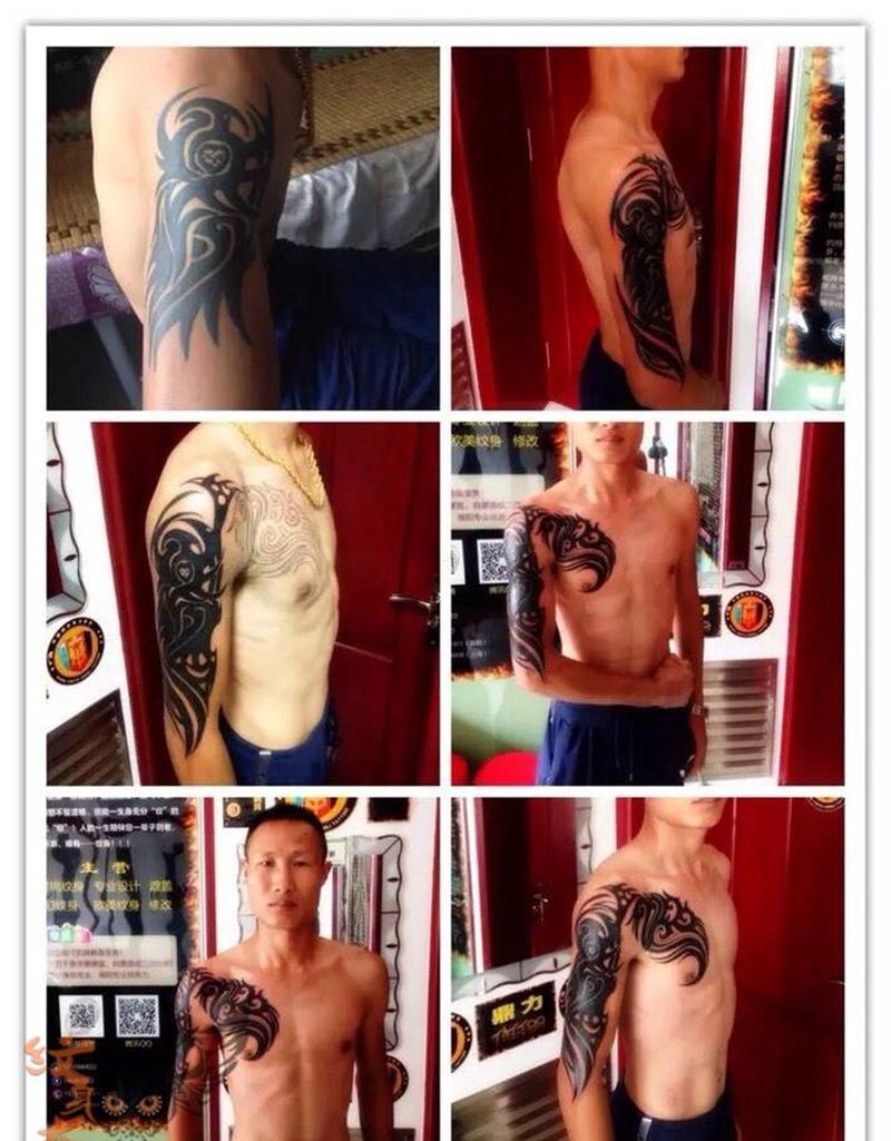 半胛图腾纹身图片_手臂传统图腾纹身图案