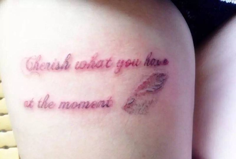 大腿子母控纹身图片_腿部传统字符纹身图案