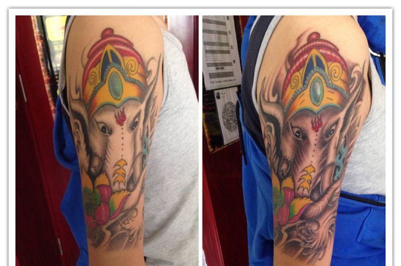 大臂象神纹身图片