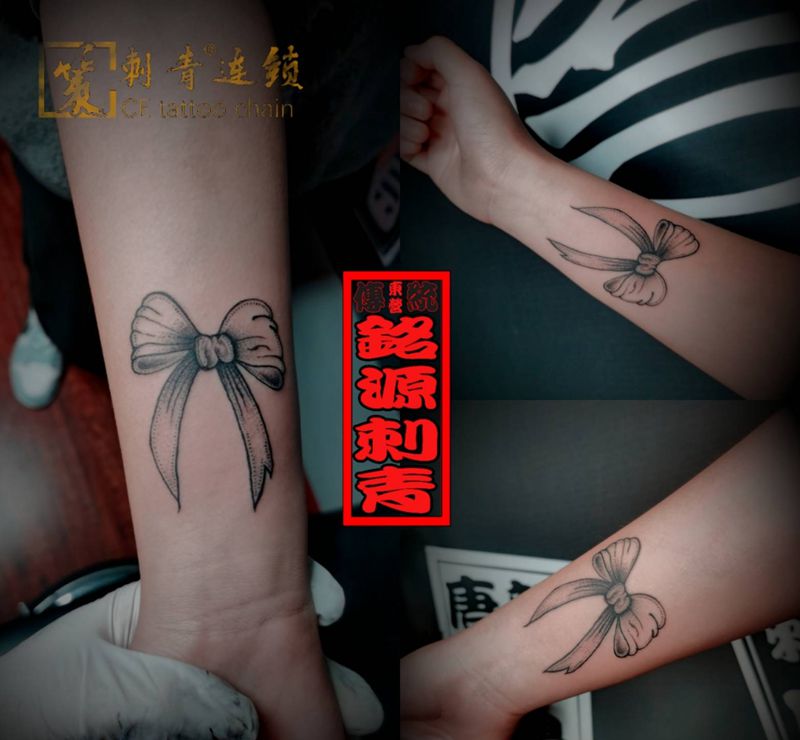 小小蝴蝶结纹身图片_手臂小清新纹身图案