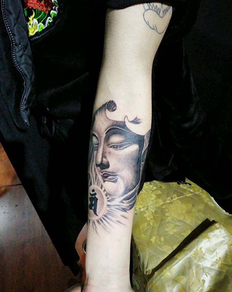 小臂佛纹身图片