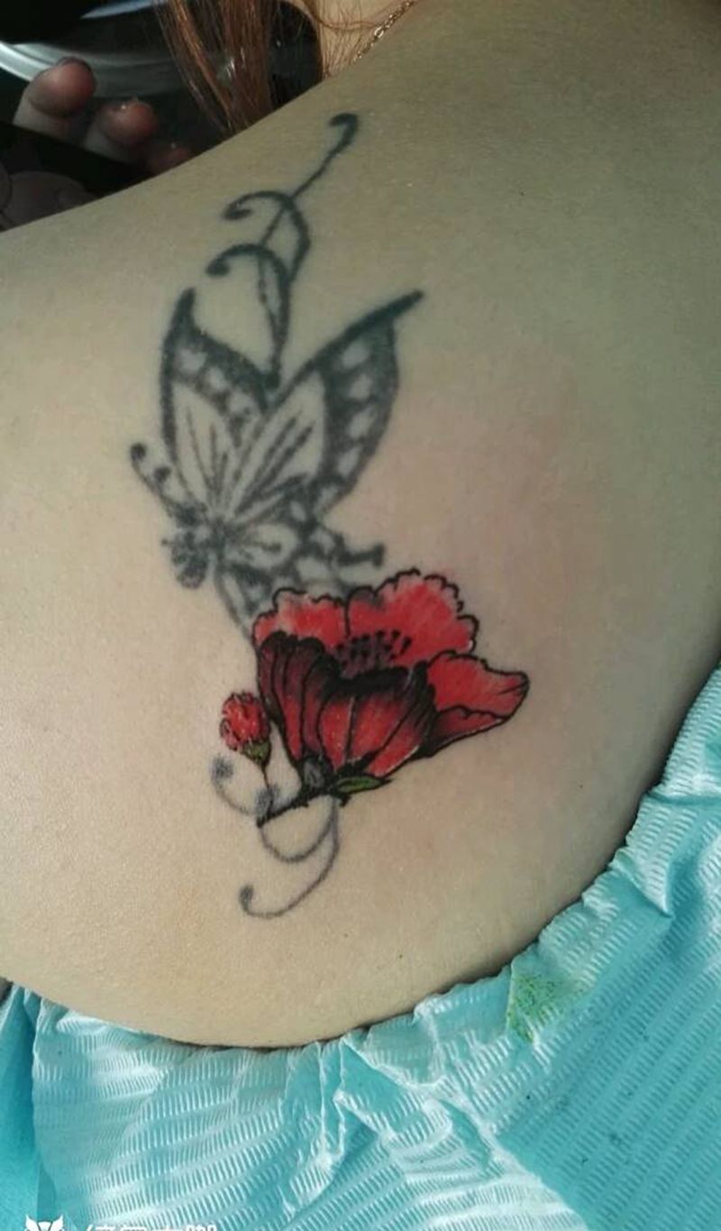 罂粟花遮盖纹身图片_背部传统国画植物原创成品纹身图案