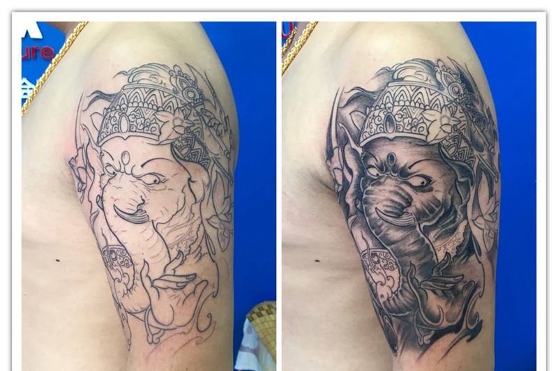 大臂彩色象神纹身图片