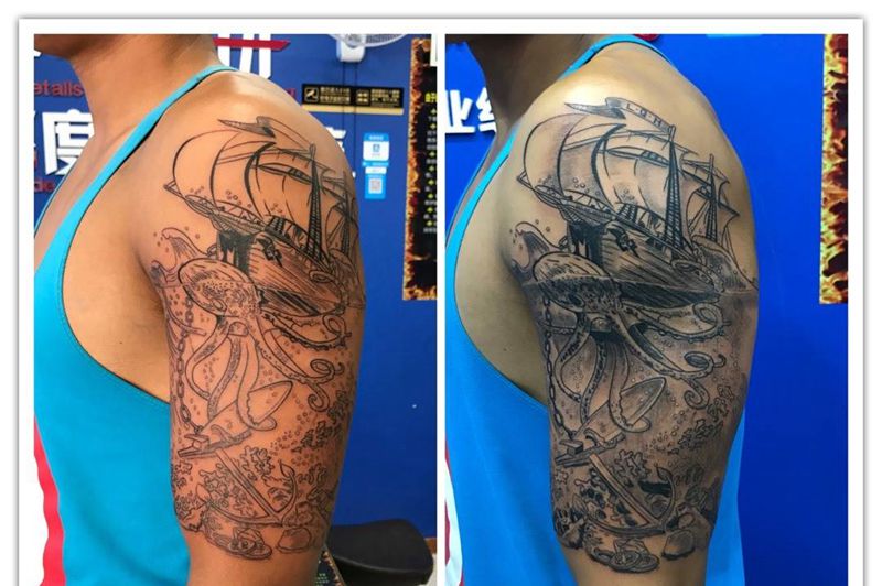 大臂扬帆起航纹身图片
