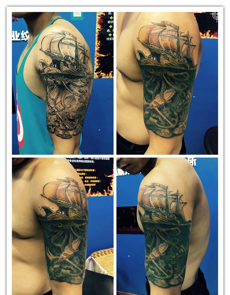 大臂扬帆纹身图片