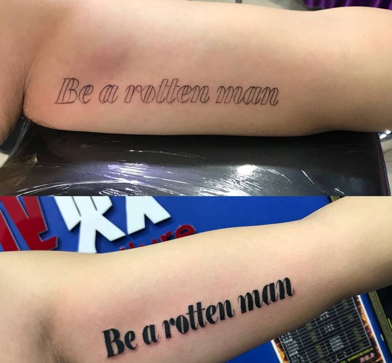 大臂内侧英文控纹身图片