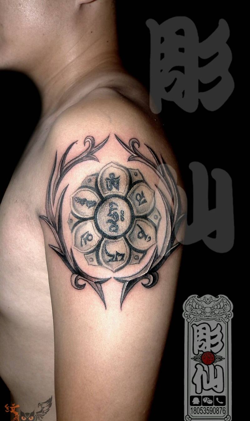 六子真轮外框纹身图片_手臂传统宗教彫仙纹身图案