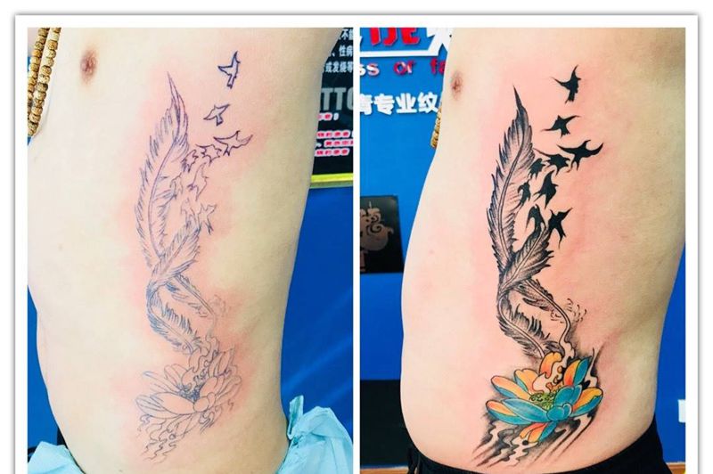 侧肋羽飞燕恋荷纹身图片_成品腰部传统静物植物纹身图案