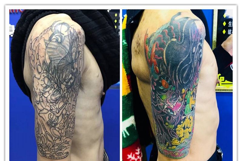 大臂招财貔貅纹身图片