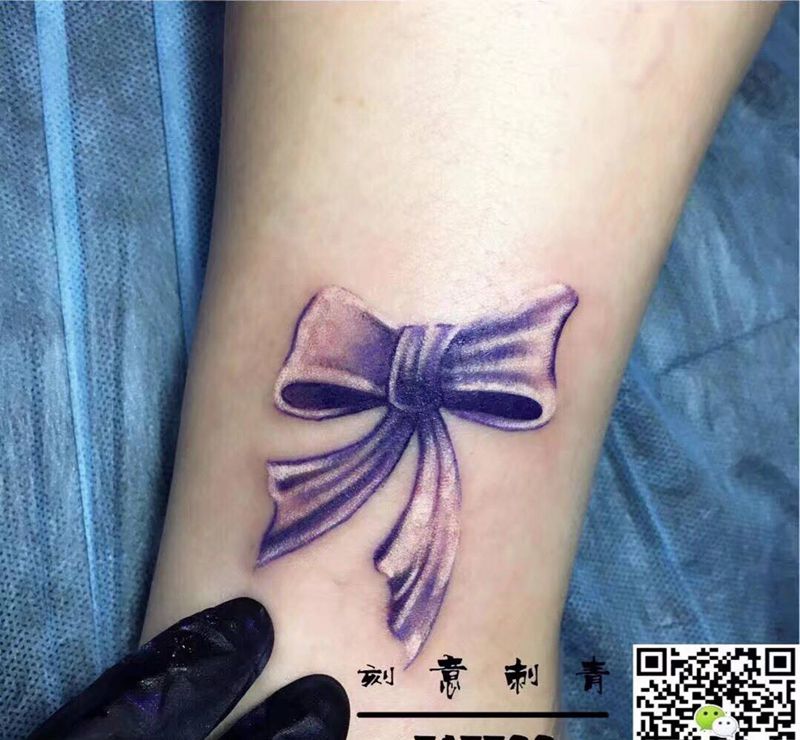 蝴蝶结纹身图片_成品腿部清新静物纹身图案