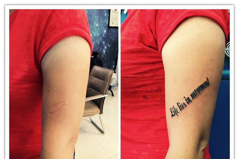 大臂英文控纹身图片