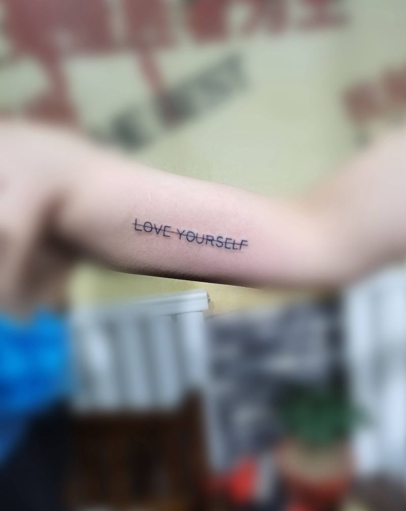 小英文一枚纹身图片_手臂纹身图案