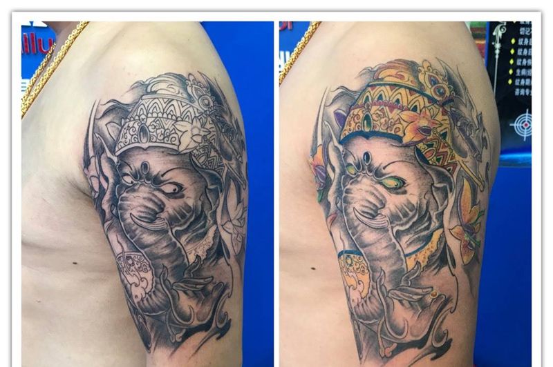 大臂彩色象神纹身图片