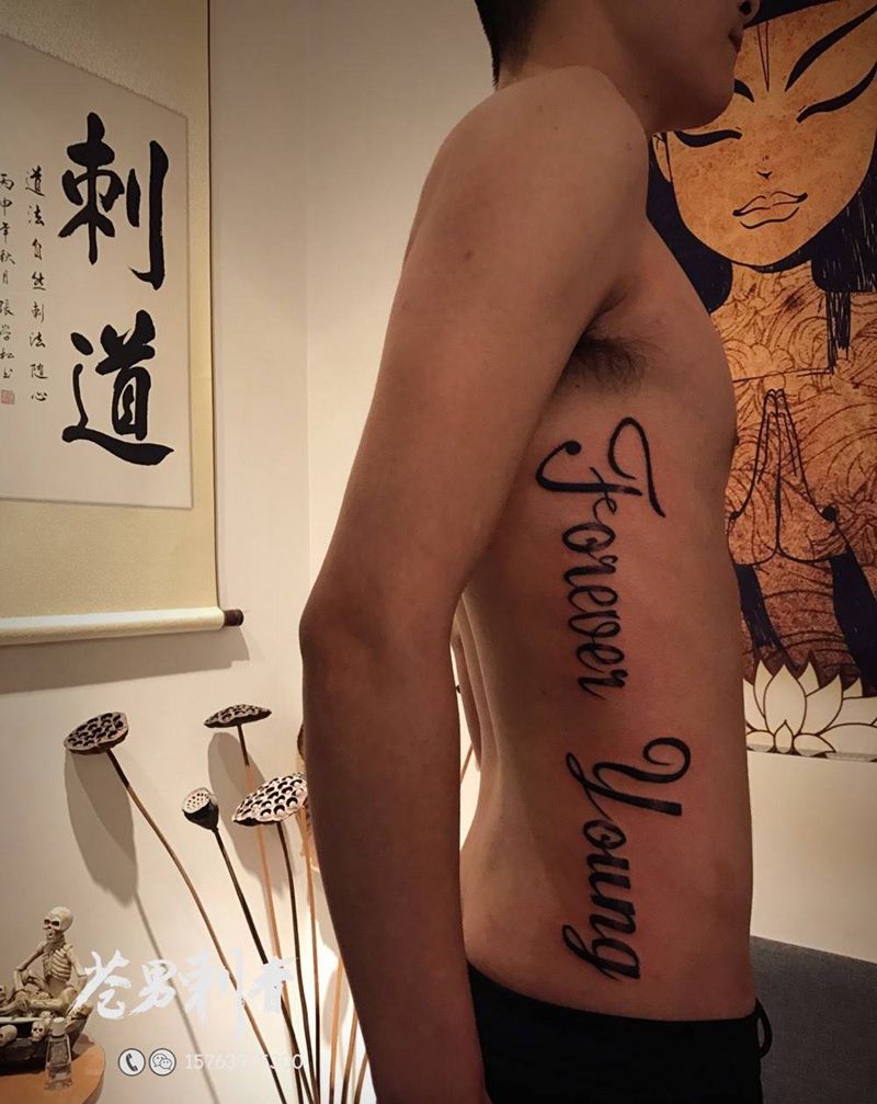 字体纹身图片_成品腹部纹身图案