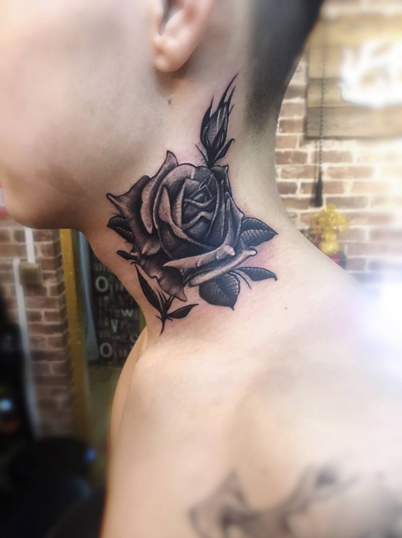 一朵花纹身图片_肩部颈部点刺纹身图案