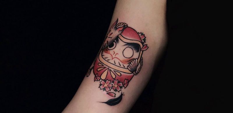 达摩蛋纹身图片_手臂新传统纹身图案