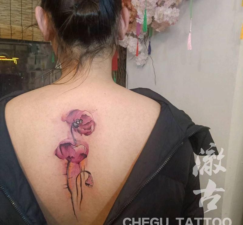 水彩纹身图片_背部水彩纹身图案