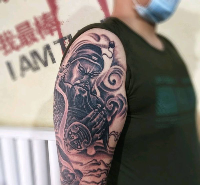 大臂关公纹身图片_手臂纹身图案