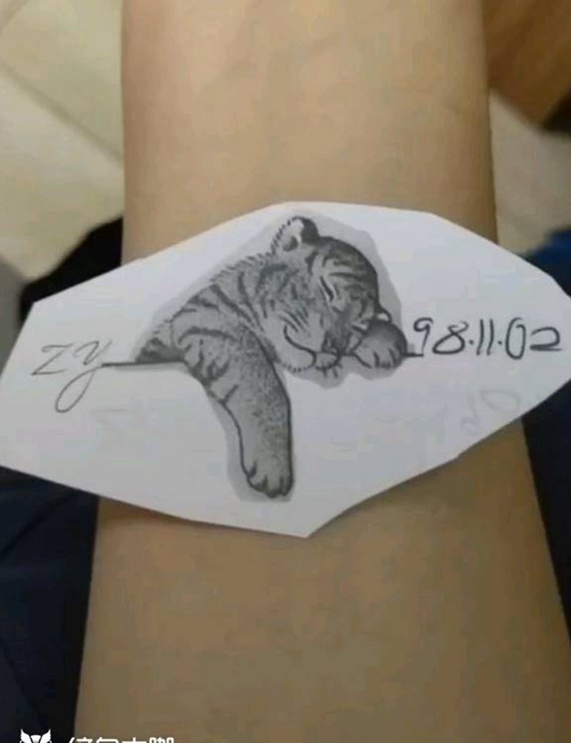 脑斧纹身图片_手臂纹身图案