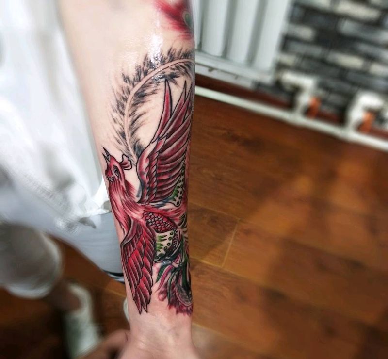 小臂凤凰纹身图片_手臂纹身图案