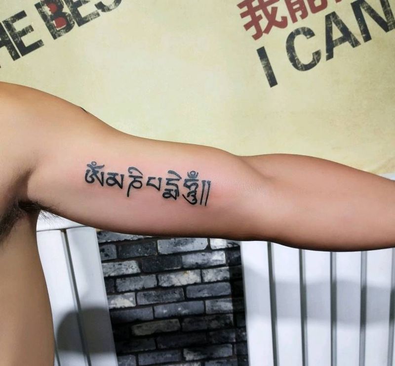 六字真言纹身图片_手臂纹身图案