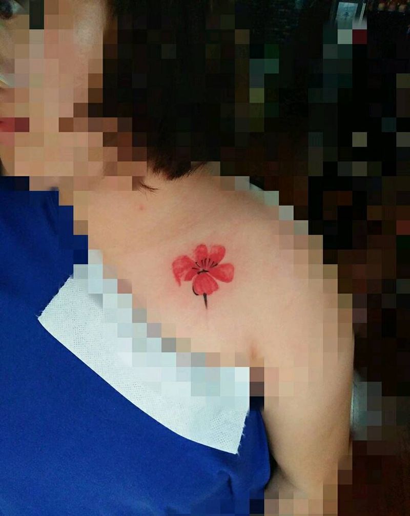 又是一朵小花纹身图片