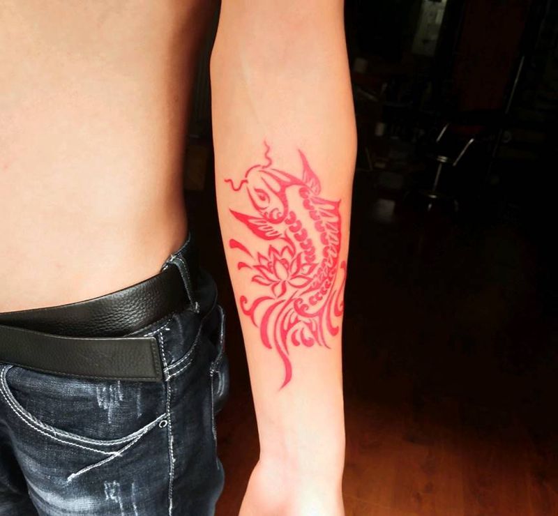 图腾锦鲤纹身图片_手臂图腾纹身图案