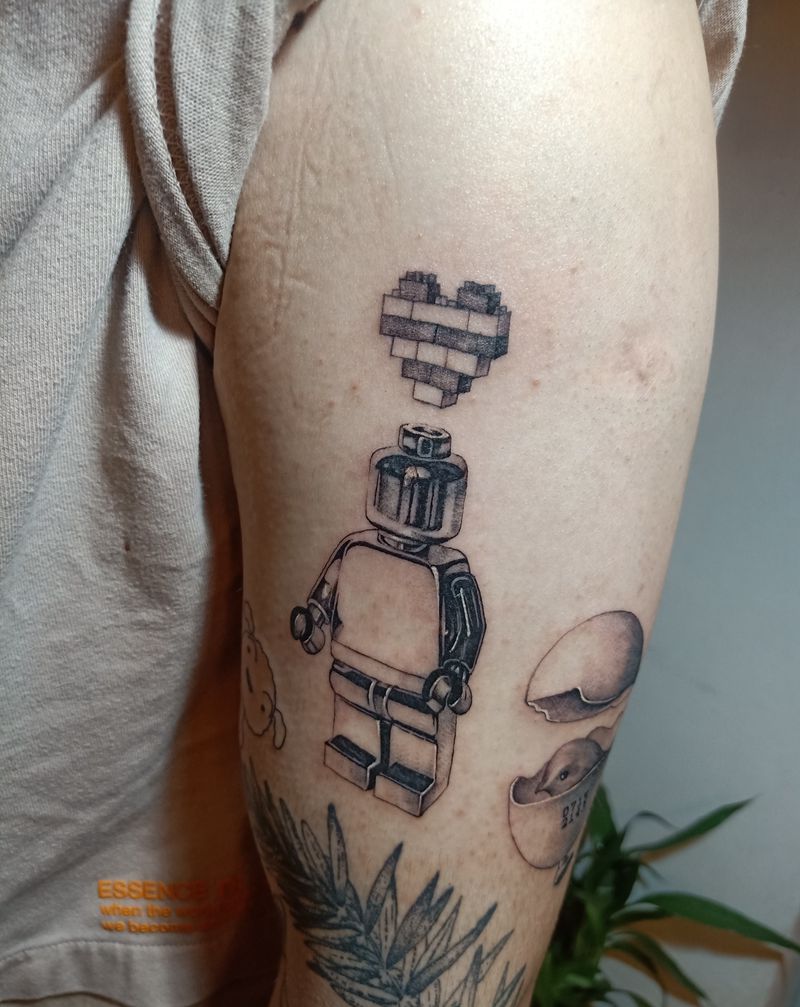 乐高纹身图片_手臂欧美写实点刺纹身图案