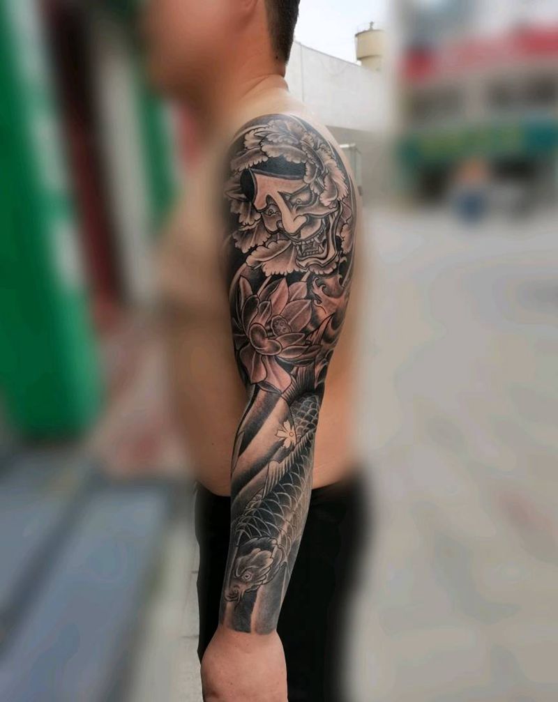 传统花臂纹身图片_手臂老传统纹身图案