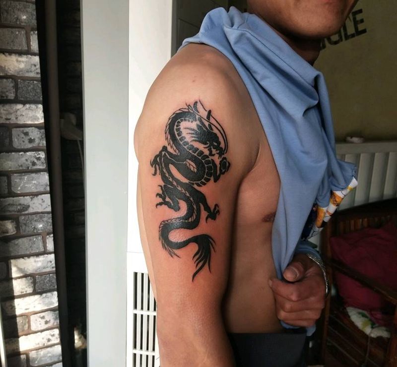 图腾龙纹身图片_手臂纹身图案