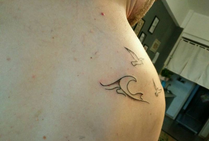 海鸥浪花纹身图片