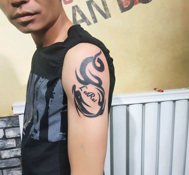 图腾龙纹身图片_手臂纹身图案