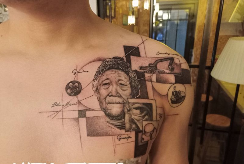 设计欧美写实纹身图片_胸部欧美写实几何纹身图案