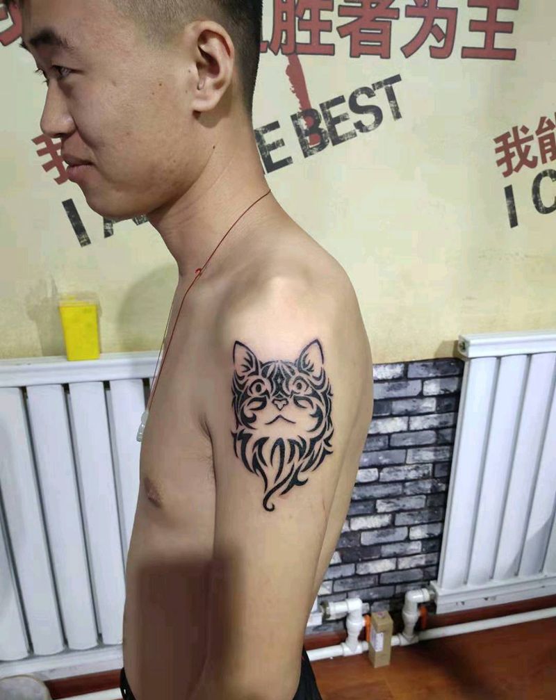 图腾猫纹身图片_手臂纹身图案