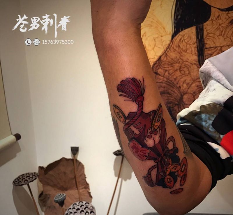 钱袋子纹身图片_成品手臂纹身图案