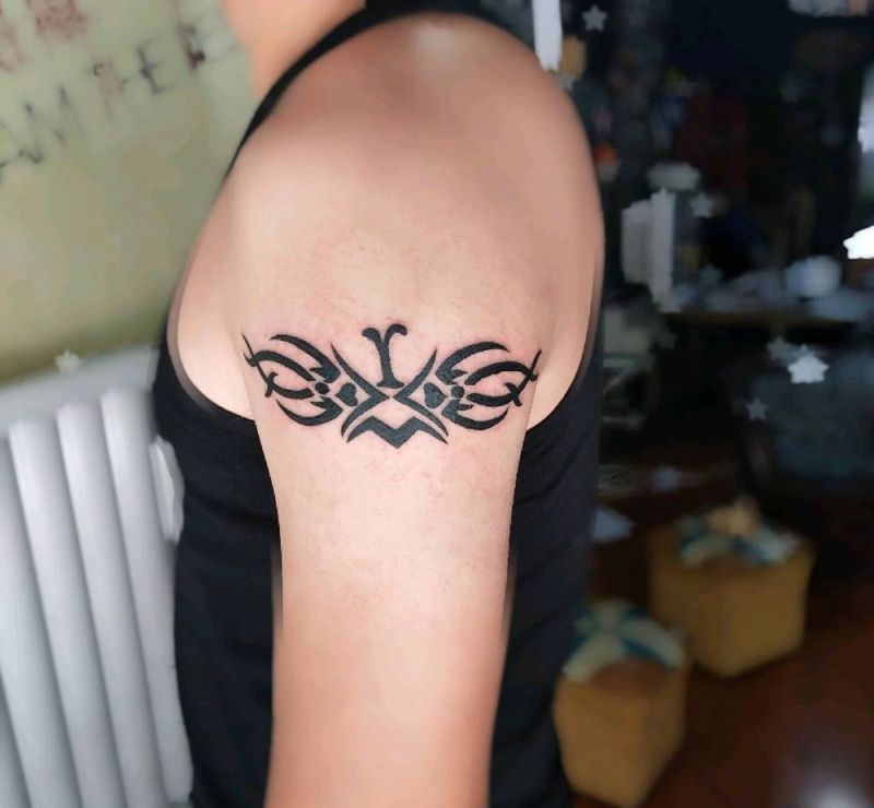 大臂图腾纹身图片_手臂图腾纹身图案