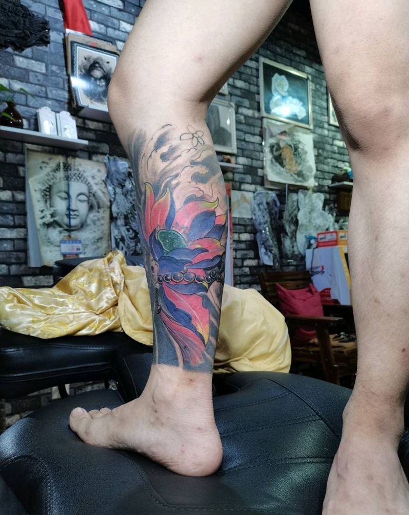 修改后荷花纹身图片_腿部纹身图案