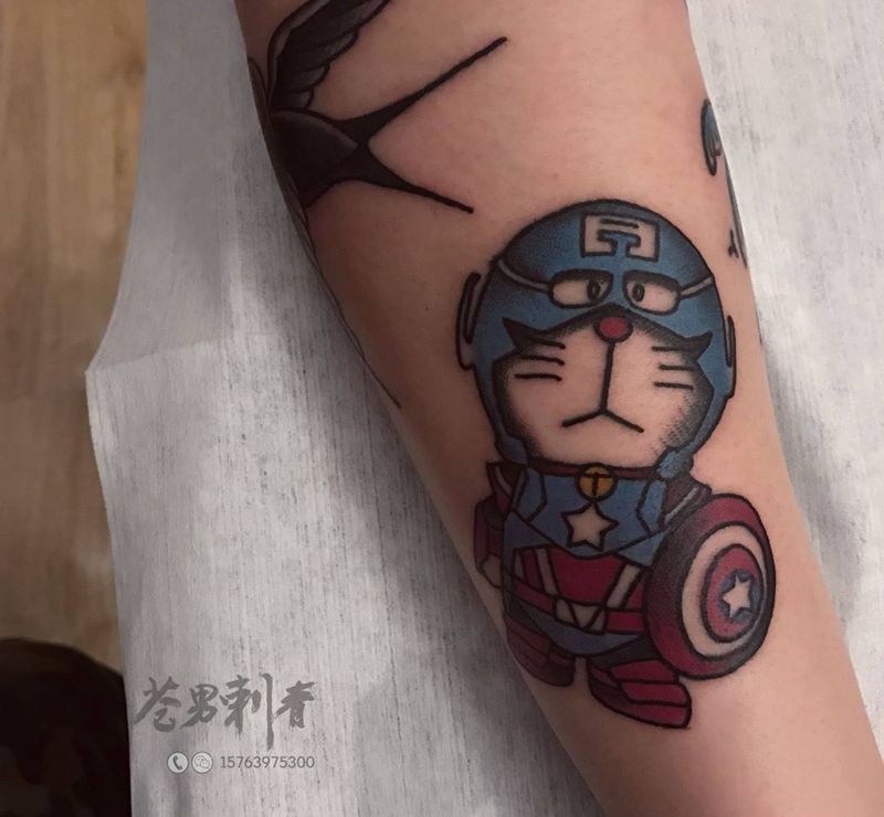 哆啦A梦纹身图片_成品手臂清新纹身图案