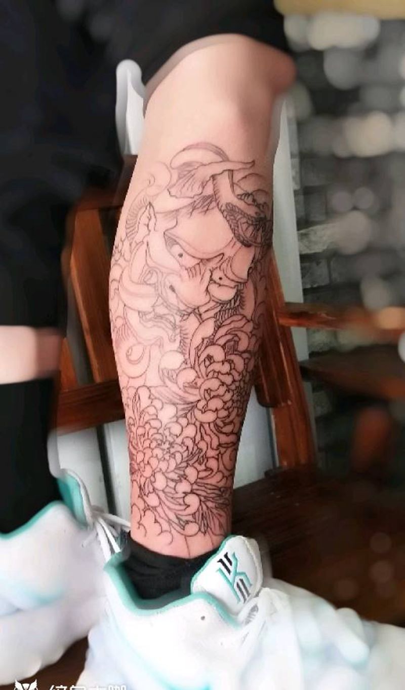 班诺菊花线条纹身图片_腿部纹身图案